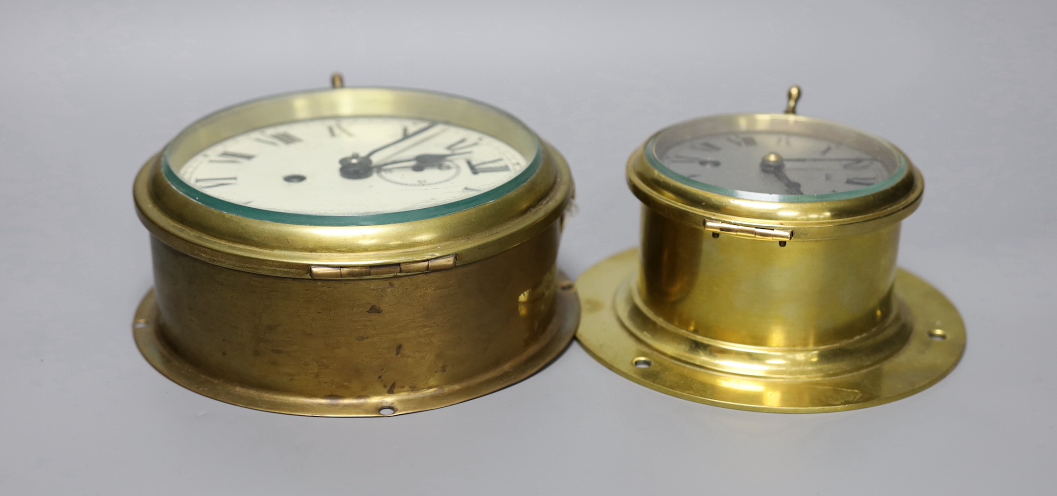 Two brass bulkhead timepieces